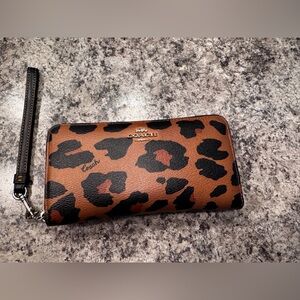 Coach leopard long zip around wallet wristlet. Used very good condition.